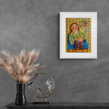 Kona í skræpóttum blóma topp með blóm í hendi