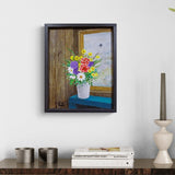 Blóm við glugga í gömlum bústað